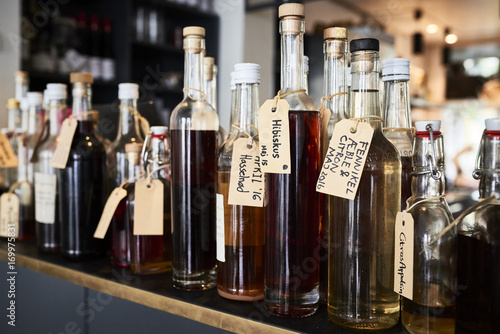 Bottles of different bitters and liqueurs photo