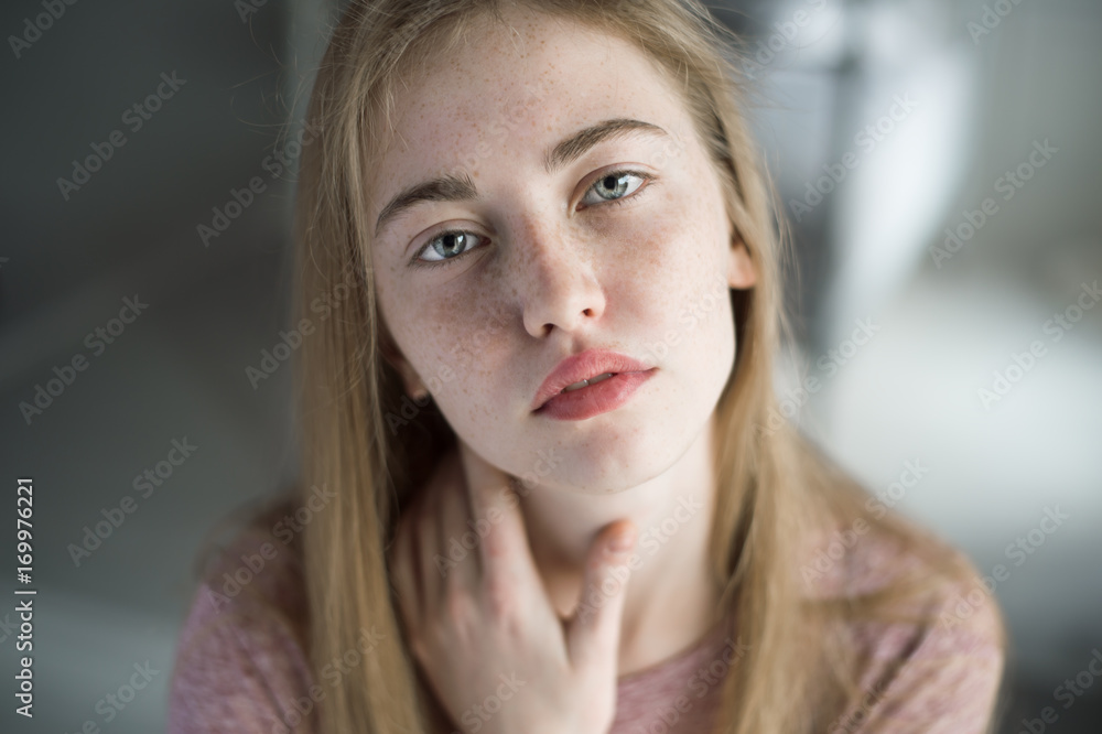 portrait of a beautiful cute girl with freckles portrait of a beautiful cute girl with freckles