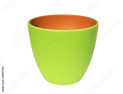 A bright green ceramic flower pot isolated on white background. photo