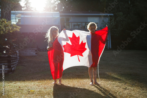 Two girls and a Canadian Flag. photo