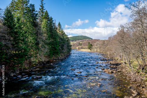 A view of Dee river from the bridge in Balmoral Castle, Scotland photo
