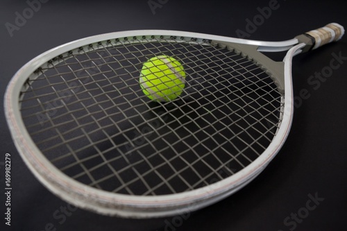 High angle view tennis racket on ball © WavebreakMediaMicro