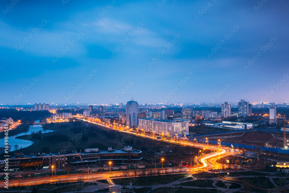 Minsk, Belarus. Aerial Cityscape In Bright Blue Hour Evening And Yellow Illumination Spring Twilight.