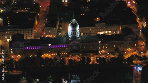 Montreal Quebec Aerial v46 Birdseye view flying low around Bonsecours Market building at night photo
