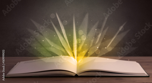 Fototapeta Naklejka Na Ścianę i Meble -  Yellow lights over book