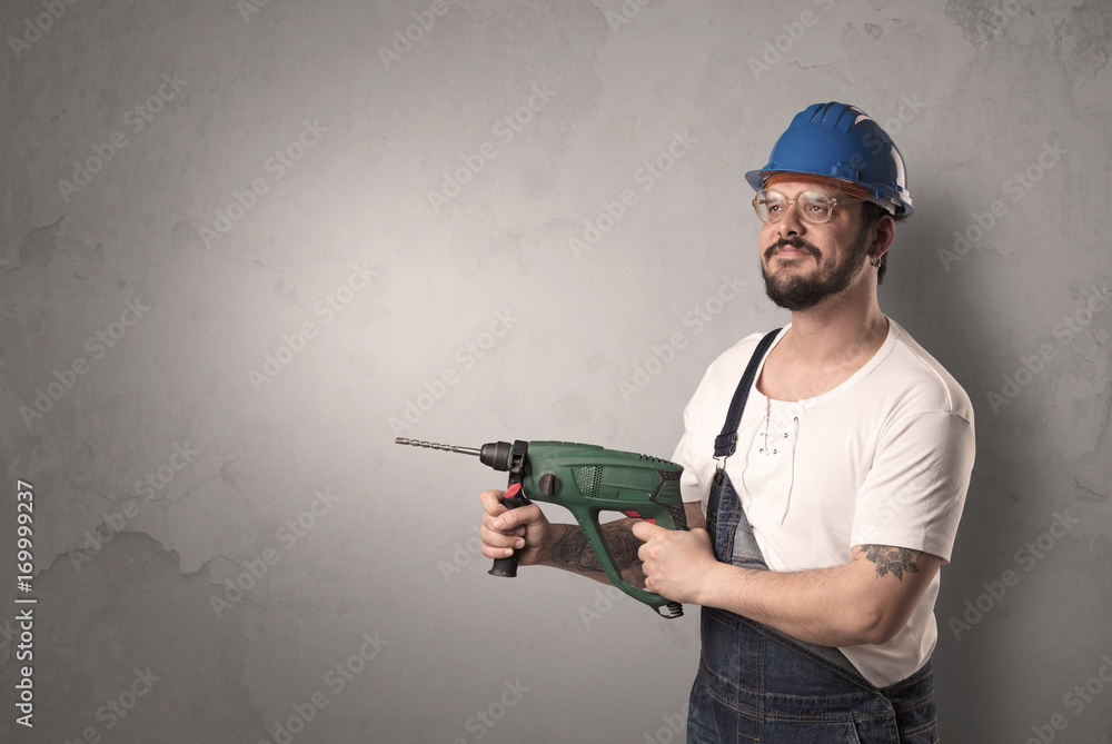 Craftsman standing in front of an empty wall. Craftsman standing in front of an empty wall.