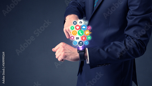 Businessman wearing smartwatch.