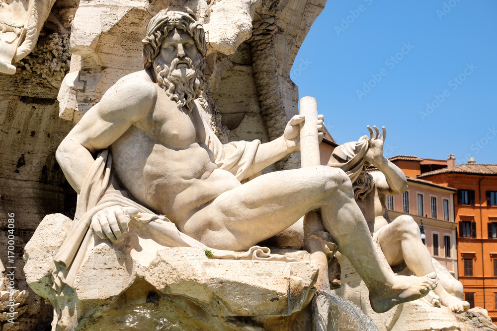 Fototapeta premium The Fountain of the Four Rivers at Piazza Navona in central Rome