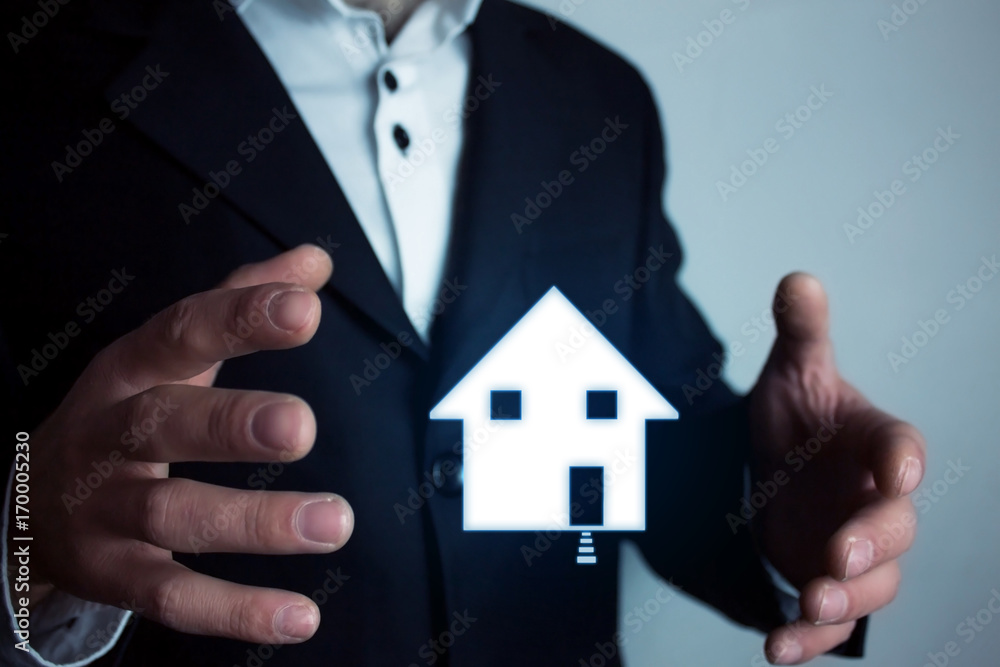 Man holding house. Real estate concept. Man holding house. Real estate concept.