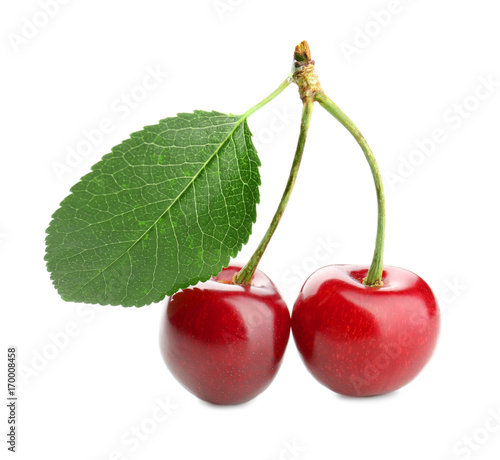 Red cherries with leaf, isolated on white