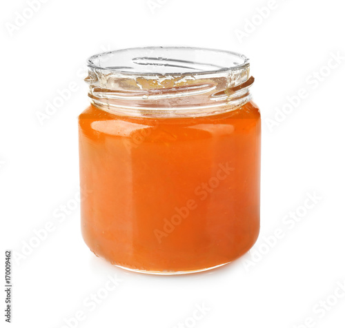 Apricot jam in jar, isolated on white