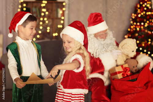 Cute elf children with lett...