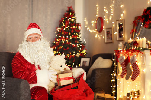 Santa Claus with gift bag i...