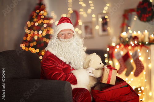 Santa Claus with gift bag i...