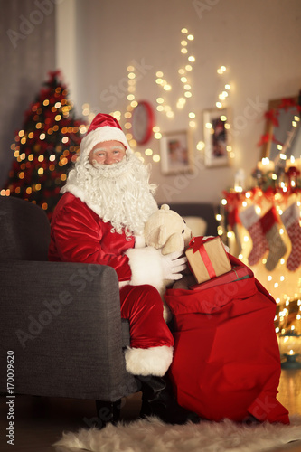 Santa Claus with gift bag i...