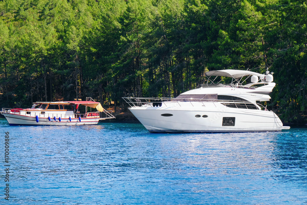 Beautiful view with modern boats in tropical resort Beautiful view with modern boats in tropical resort
