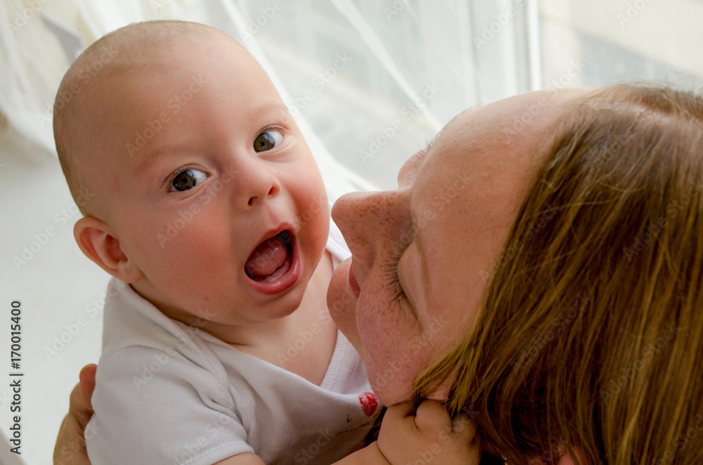 Happy mother with newborn baby