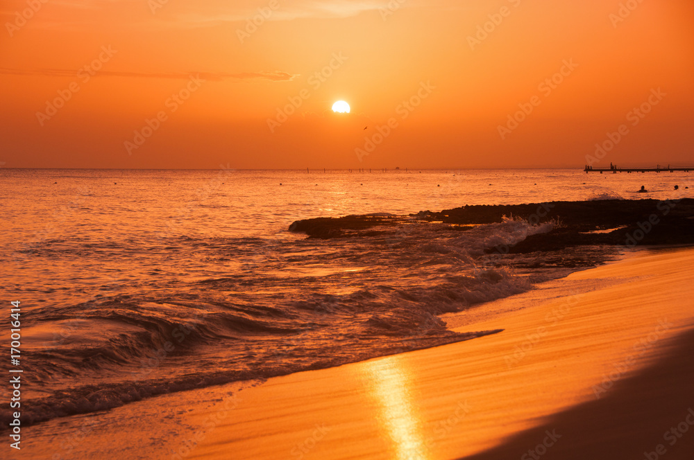 Obraz premium Sunset on the coast of the Caribbean Sea. Dominican sunset.