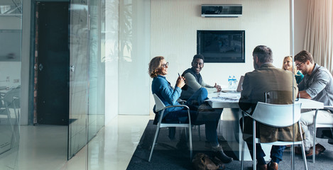 Team at meeting in office