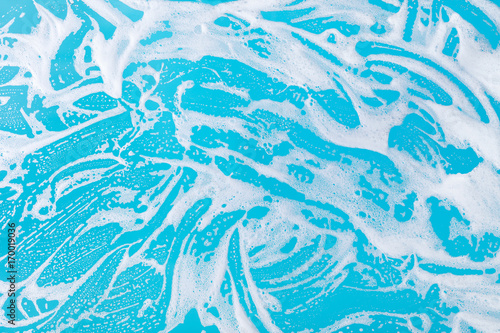 soap foam on a blue background