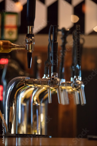 Cranes keg with strange tap handles in bar