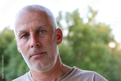 Portrait of a mature bald man