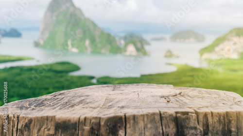 Quadro em tela Old empty wood table on top of mountain view island and beach abstract background