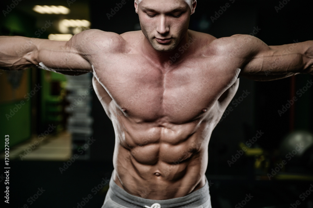 young man train in gym healthcare lifestyle sexy caucasian man young man train in gym healthcare lifestyle sexy caucasian man