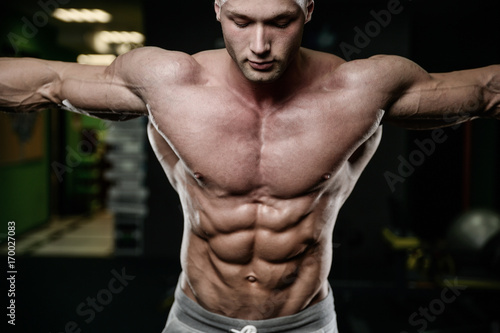 young man train in gym healthcare lifestyle sexy caucasian man