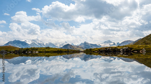 Walliser Viertausender gespiegelt im Bergsee, Schweiz photo