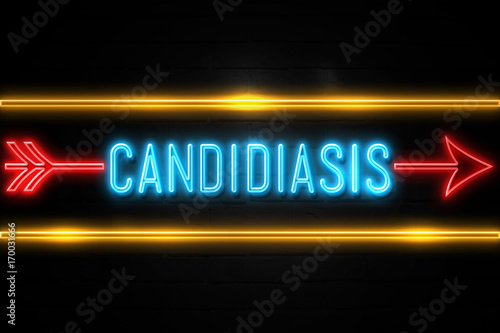 Candidiasis  - fluorescent Neon Sign on brickwall Front view