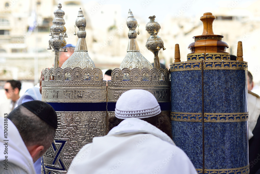 JERUSALEM, ISRAEL - APRIL 2017: Jewish man celebrate Simchat Torah. Simchat Torah is a celebratory Jewish holiday marks the completion of the annual Torah reading cycle