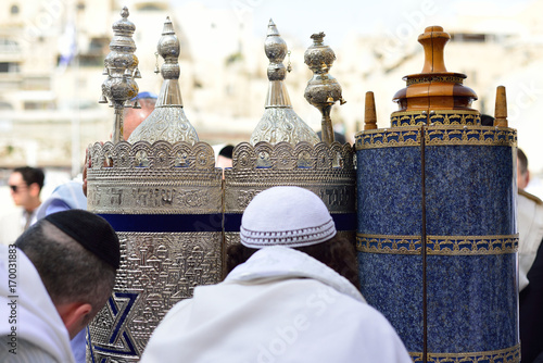 Obraz na płótnie JERUSALEM, ISRAEL - APRIL 2017: Jewish man celebrate Simchat Torah. Simchat Torah is a celebratory Jewish holiday marks the completion of the annual Torah reading cycle w salonie