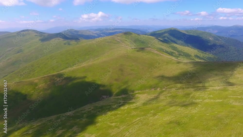 Epic aerial flight over mountains in beautiful summer day Epic aerial flight over mountains in beautiful summer day