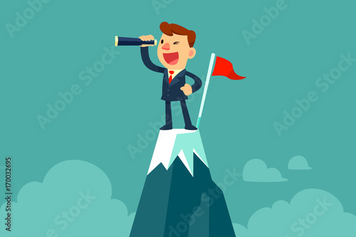 businessman holding spyglass on top of mountain