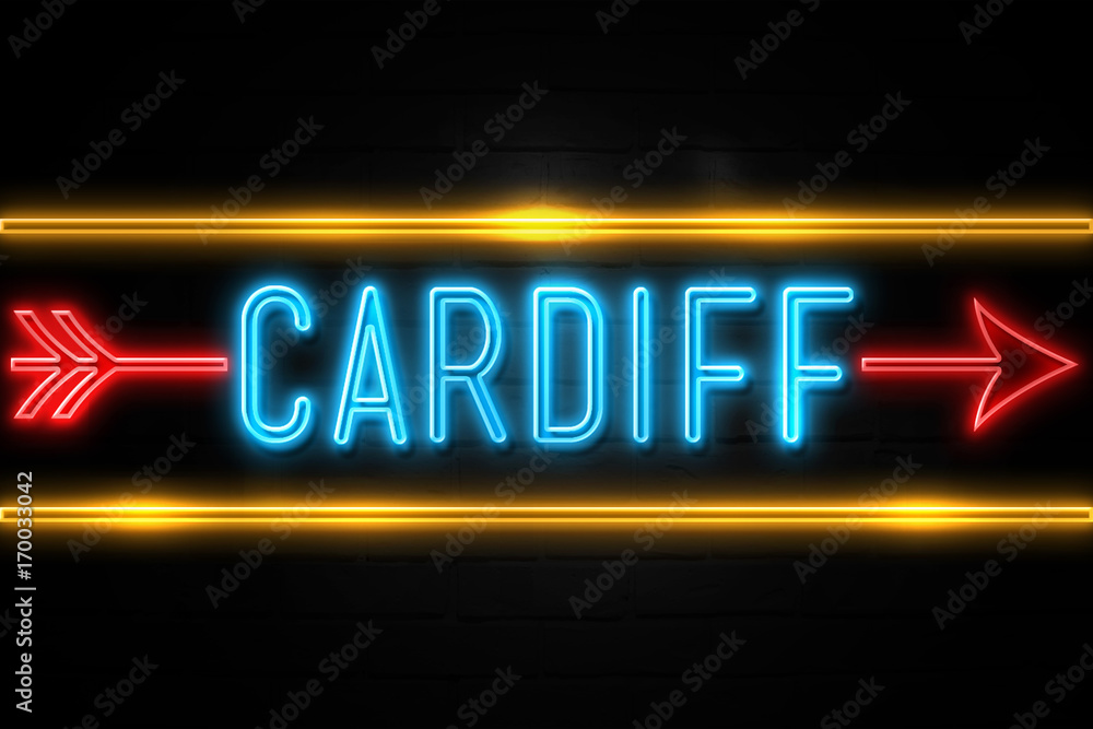 Cardiff - fluorescent Neon Sign on brickwall Front view Cardiff - fluorescent Neon Sign on brickwall Front view