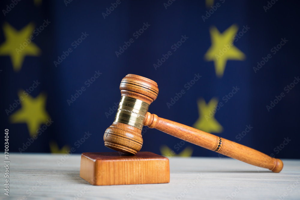 Law and Justice symbols. EU flag background. Law and Justice symbols. EU flag background.