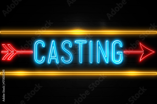 Casting  - fluorescent Neon Sign on brickwall Front view
