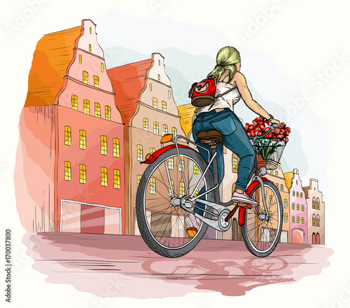 Bicyclist girl in city