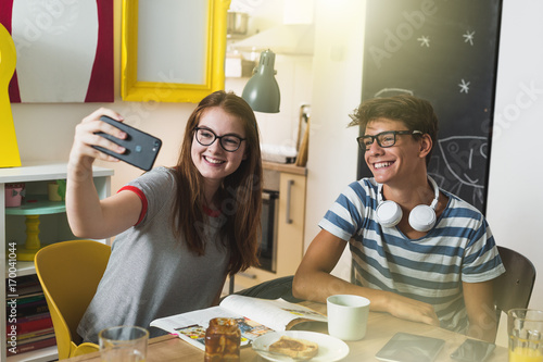 say cheese. teenagers taking seflie. photo