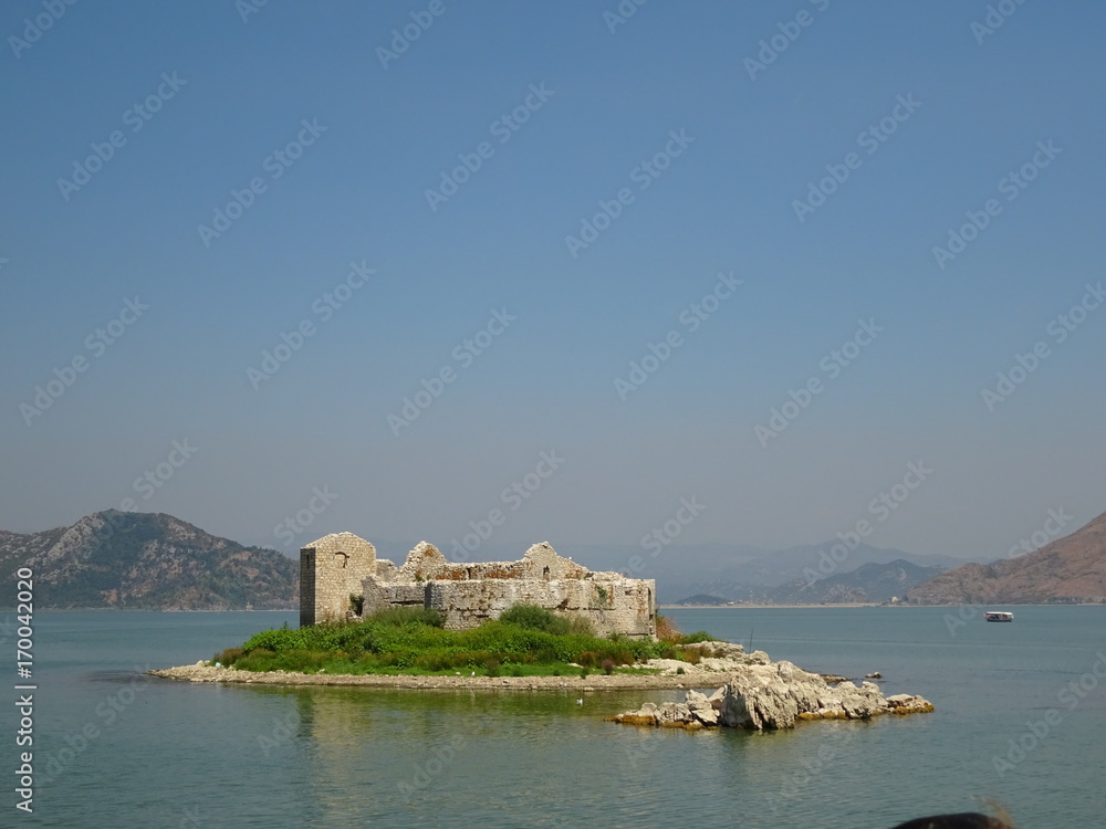 Distance view of the old prison in the Skadar lake