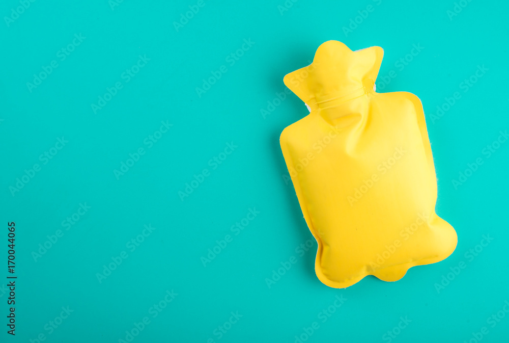 Yellow hot water bottle with Text Space,top view Stock Photo Adobe Stock