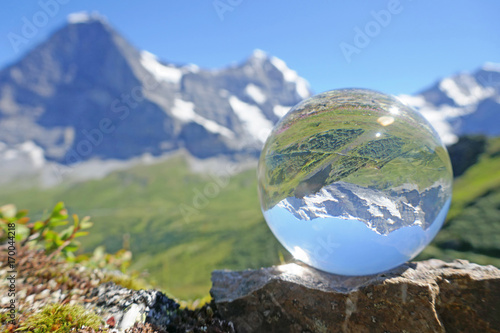 alpen in kristallkugel  berner oberland  schweiz 