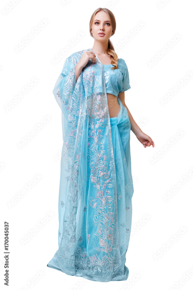 Caucasian young woman in blue indian national dress isolated Caucasian young woman in blue indian national dress isolated
