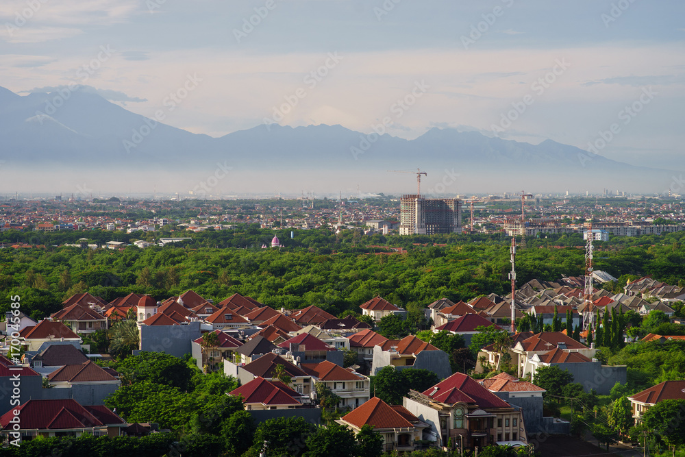 bird view over city on sun rise in Surabaya, Indonesia