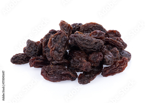 Dried raisins on white background