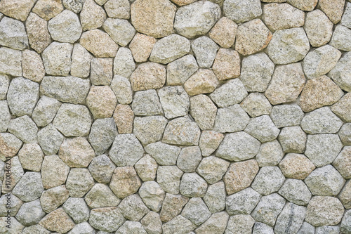 Grunge old stone brick wall texture background.