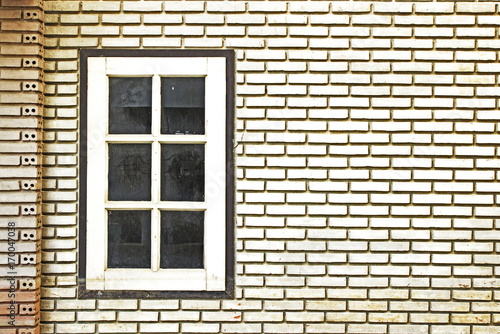 textured of brick walls sandstone background with window