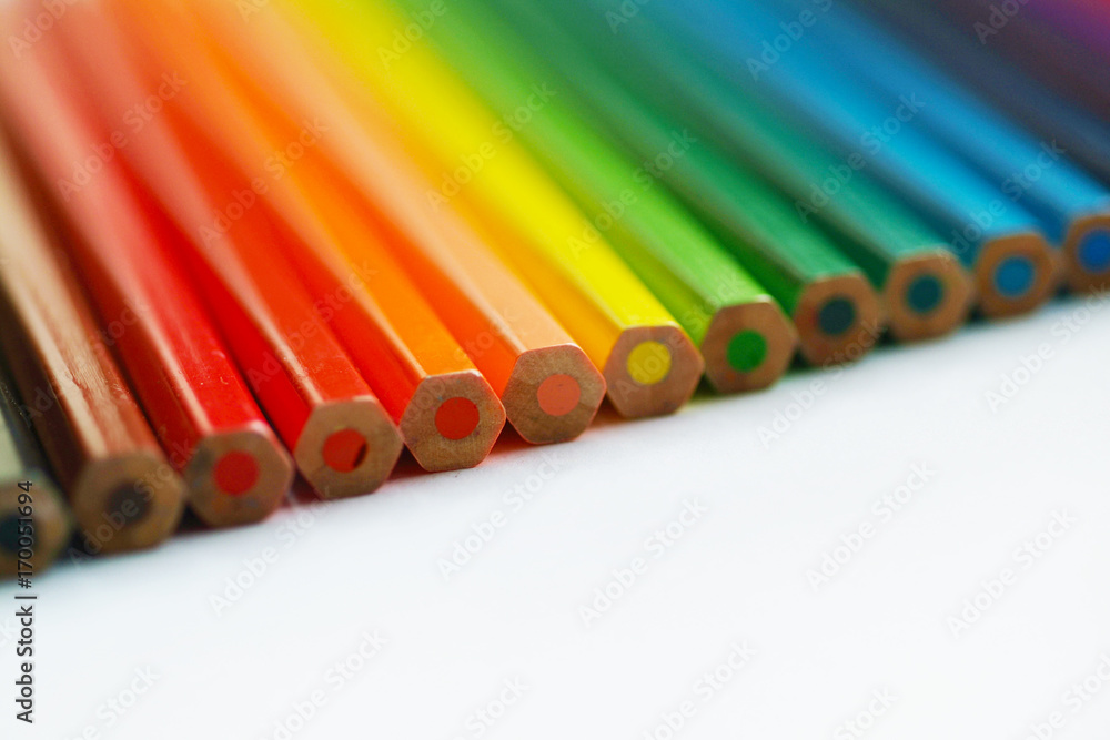 Blurry color pencils with fuzzy edges on white background. Close up view Blurry color pencils with fuzzy edges on white background. Close up view