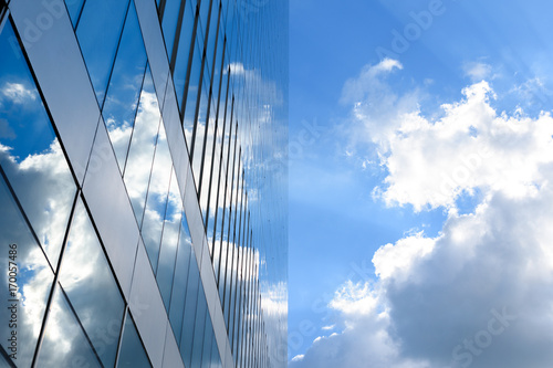 Glass skyscraper reflection cloudy sky